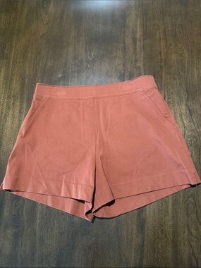 SPANX High-Waist Shorts in Rust/Clay color. Tummy control Pull-On M